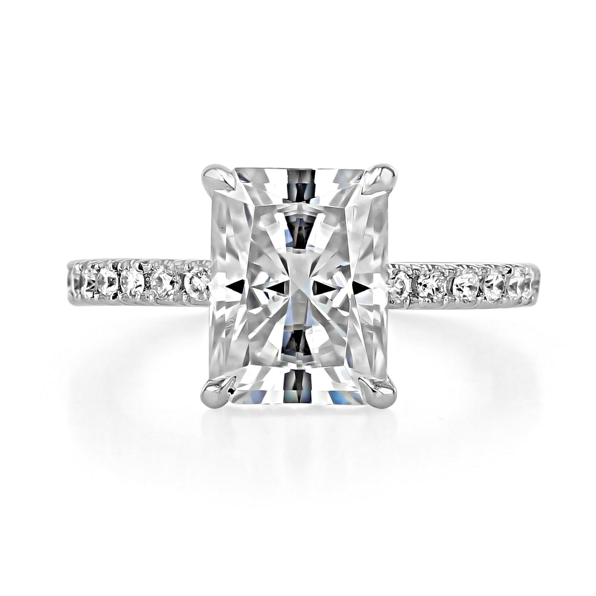 Everly | Radiant Micro-Prong Engagement Ring featuring a radiant-cut stone and a micro-prong pavé diamond band on a white background.