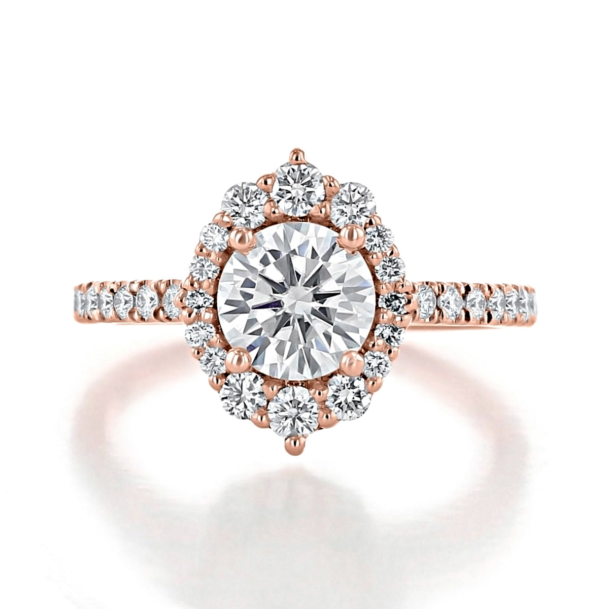 Olvera | Round Unique Halo Engagement Ring in rose gold featuring a round center diamond, a unique scalloped halo, and a micro-prong set diamond-encrusted band.