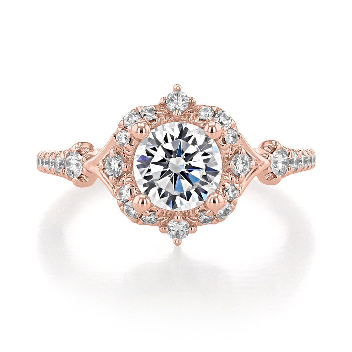 Veronique | Halo Engagement Ring by Gabriel & Co. in rose gold, featuring an antique-inspired diamond halo around a round center stone and pavé-set diamonds along the band.