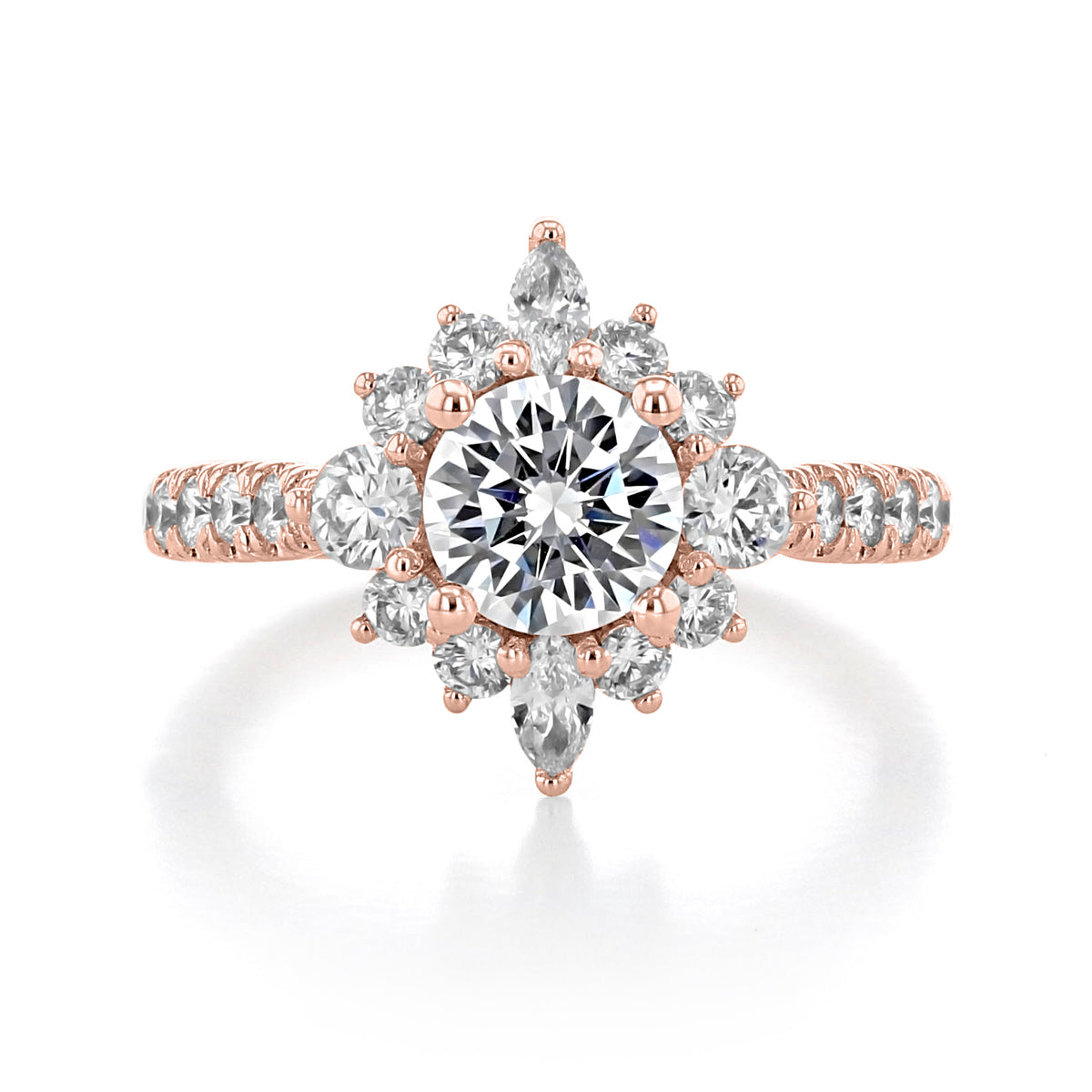 Astor Halo Engagement Ring by Gabriel & Co. in rose gold, featuring a round center stone surrounded by a celestial starburst halo of round and pear-shaped diamonds on a micro-prong set pavé band.