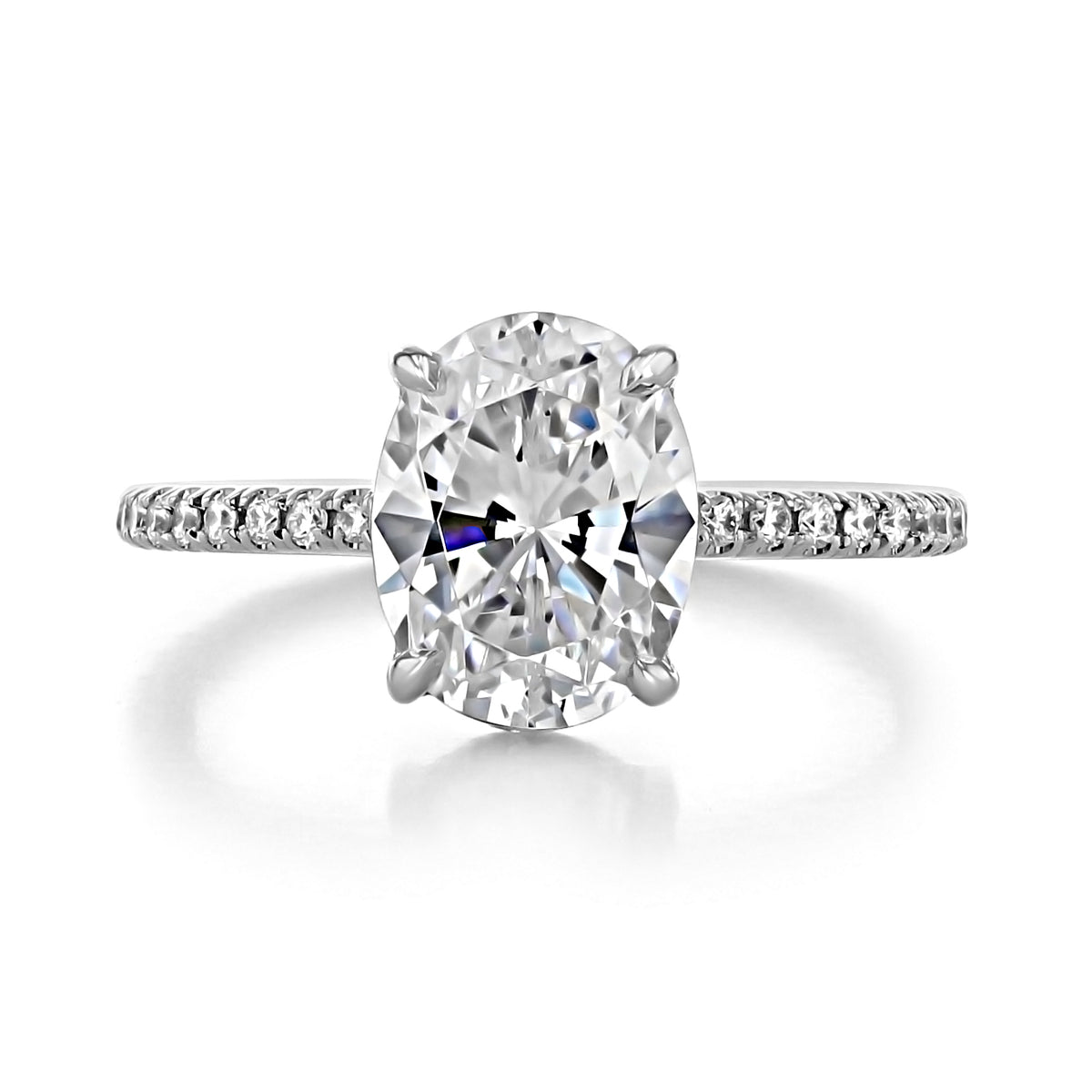 Broadway Oval Micro-Prong Engagement Ring featuring an oval-shaped diamond set on a white gold micro-prong pavé band.