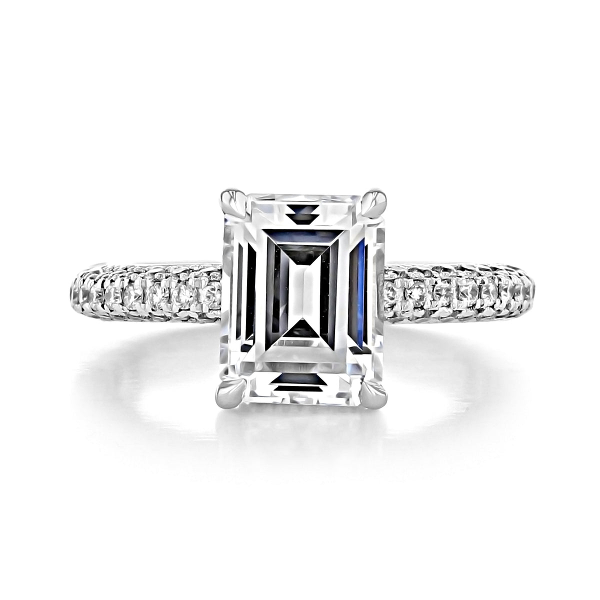 Elena | Emerald Triple Pavé Engagement Ring featuring an emerald-cut stone, a hidden halo, and a pavé-set diamond band.
