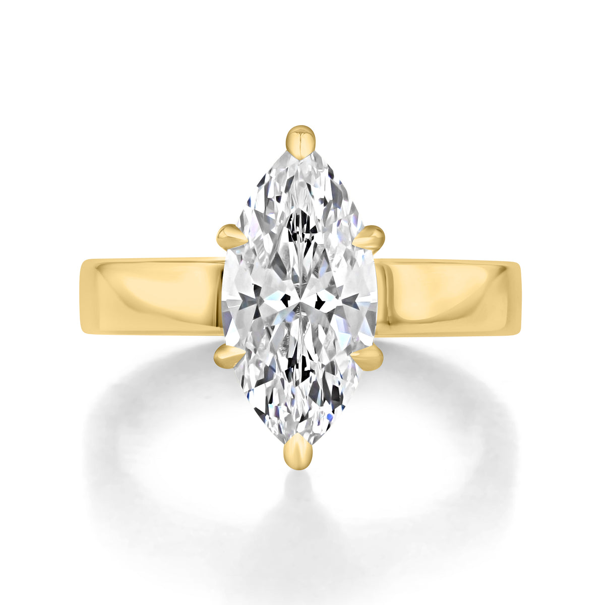 Selena | Marquise Flat-Top Solitaire Engagement Ring in 14k yellow gold, top view of a marquise center diamond on a wide flat band.