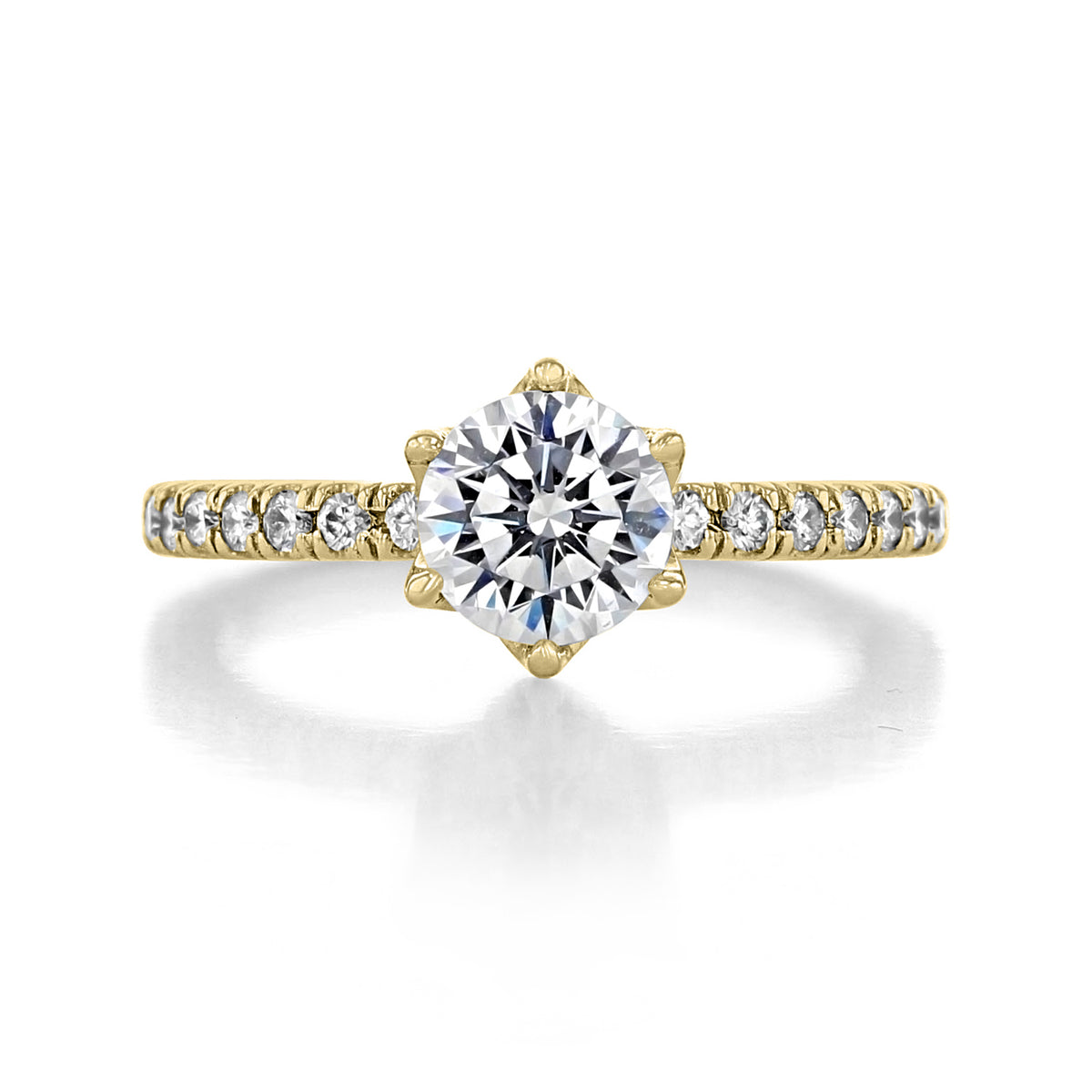 Rosalia Round Micro-Prong Engagement Ring featuring a gold band with a round center diamond in a 6-prong basket and a shank lined with micro-prong pavé diamonds.