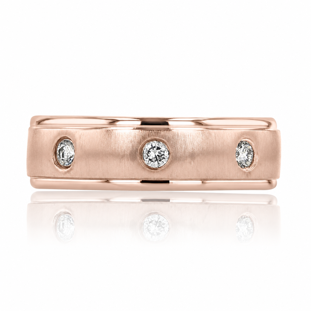 Icing On The Ring Diamond Wedding Band | FG144 in rose gold featuring three flush-set round diamonds.