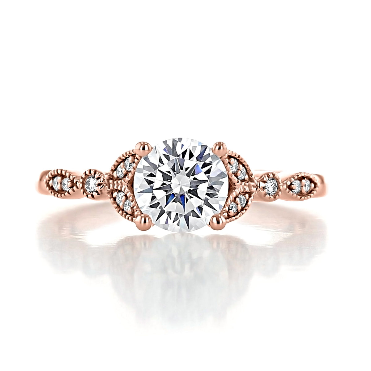Gardenia | Round Floral Pavé Engagement Ring featuring a round diamond, floral-inspired setting, and a rose-gold band with pavé-set diamonds and delicate milgrain engravings.