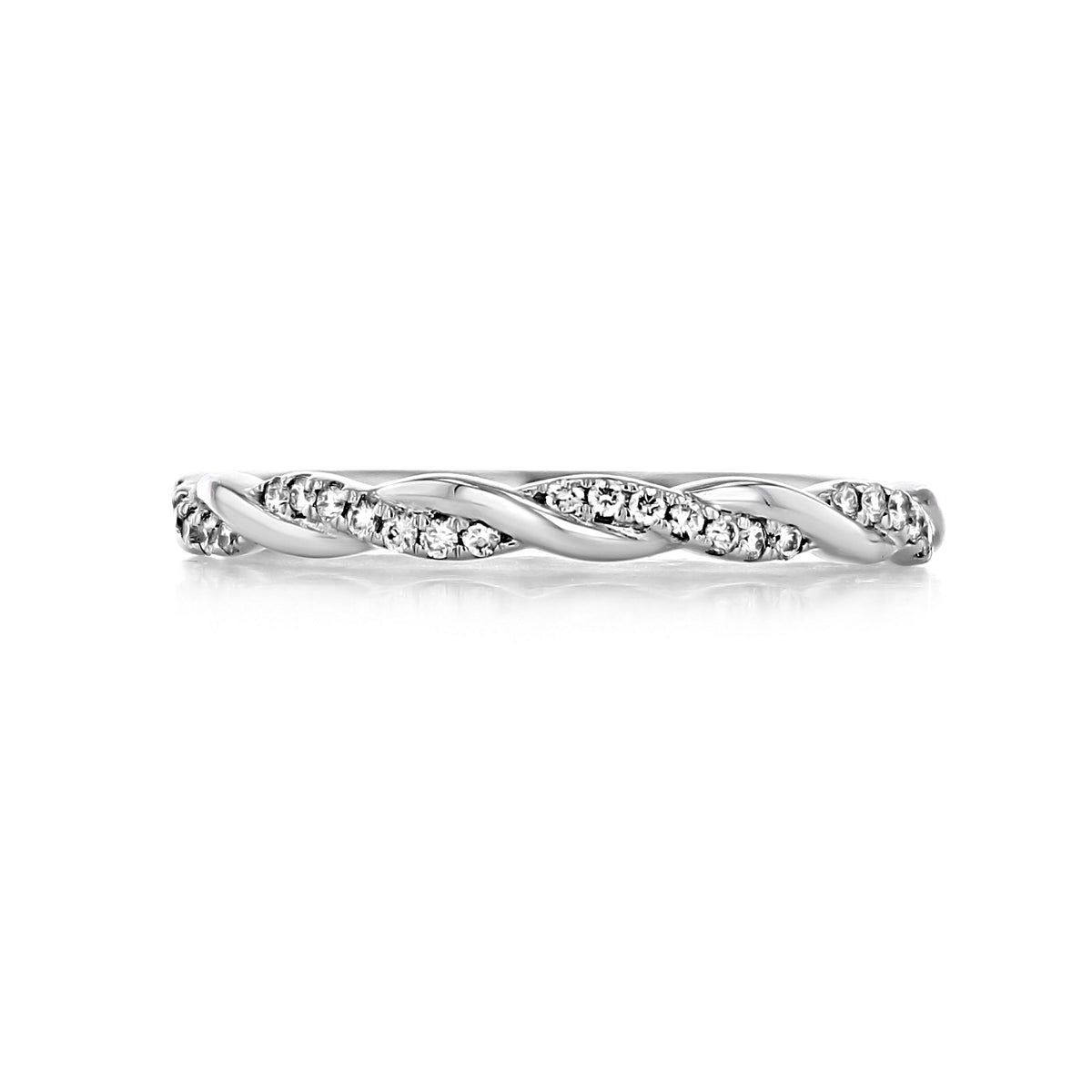 Haven | Twist Diamond Wedding Band featuring a twisted platinum band set with small round diamonds.