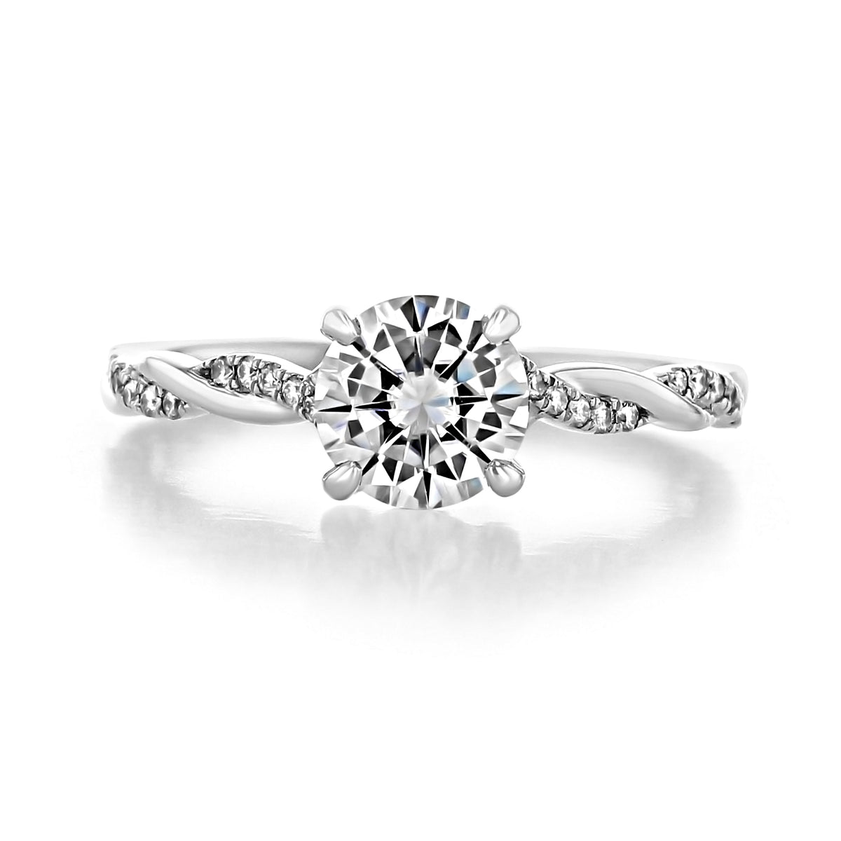 Venice | Round Twist Engagement Ring featuring a round center diamond on a micro-prong twisted band set with small diamonds.