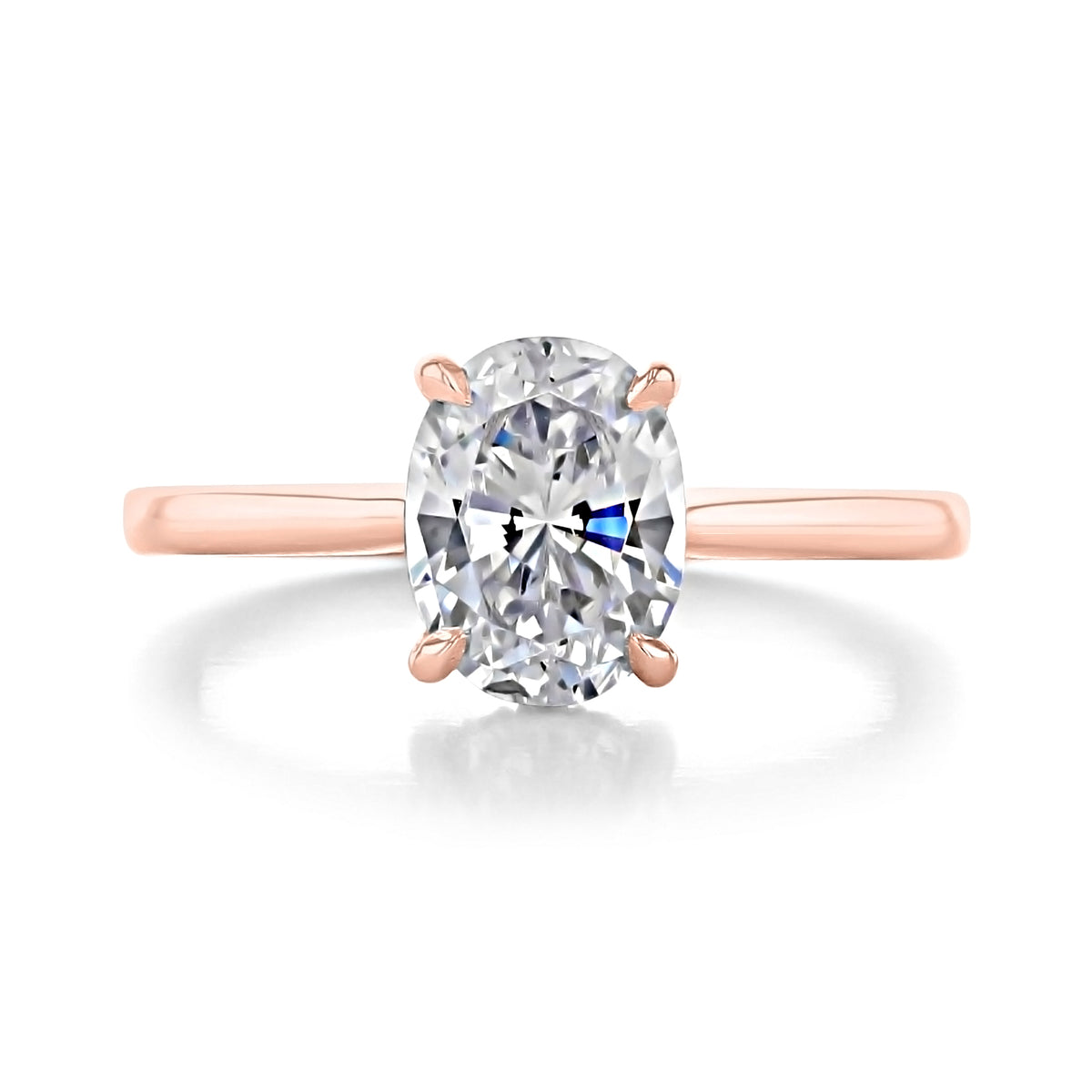 Waverly oval solitaire engagement ring with an oval-cut diamond on a thin rose gold band in a timeless style.