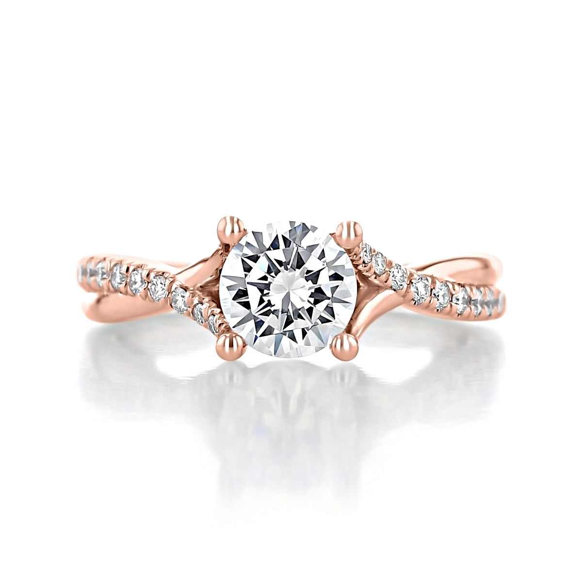 Leigh | Micro-Prong Engagement Ring by Gabriel & Co. featuring a rose gold intertwined band with small diamonds and a round center diamond held by four prongs.