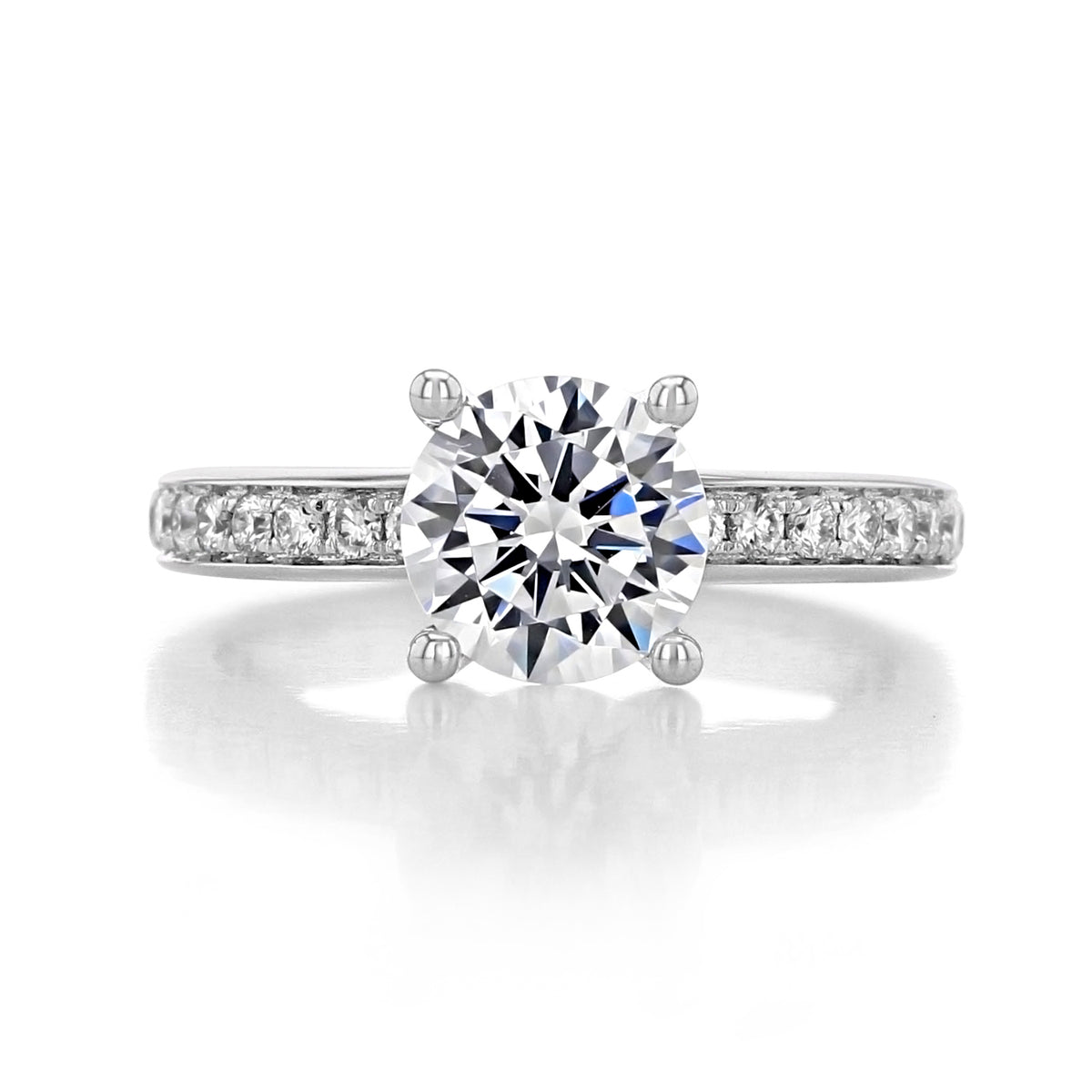 A round brilliant-cut diamond Megan Pavé Set Engagement Ring by Gabriel & Co. featuring a pavé-set diamond band.