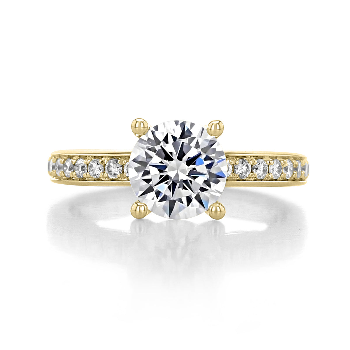 Megan pavé set engagement ring by Gabriel & Co. featuring a gold band with a 1.50ct round brilliant-cut center diamond and pavé-set side stones.