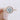 Rachel Halo Engagement Ring by Gabriel & Co. in rose gold, featuring a round center diamond and a vintage-style pavé-set diamond band.