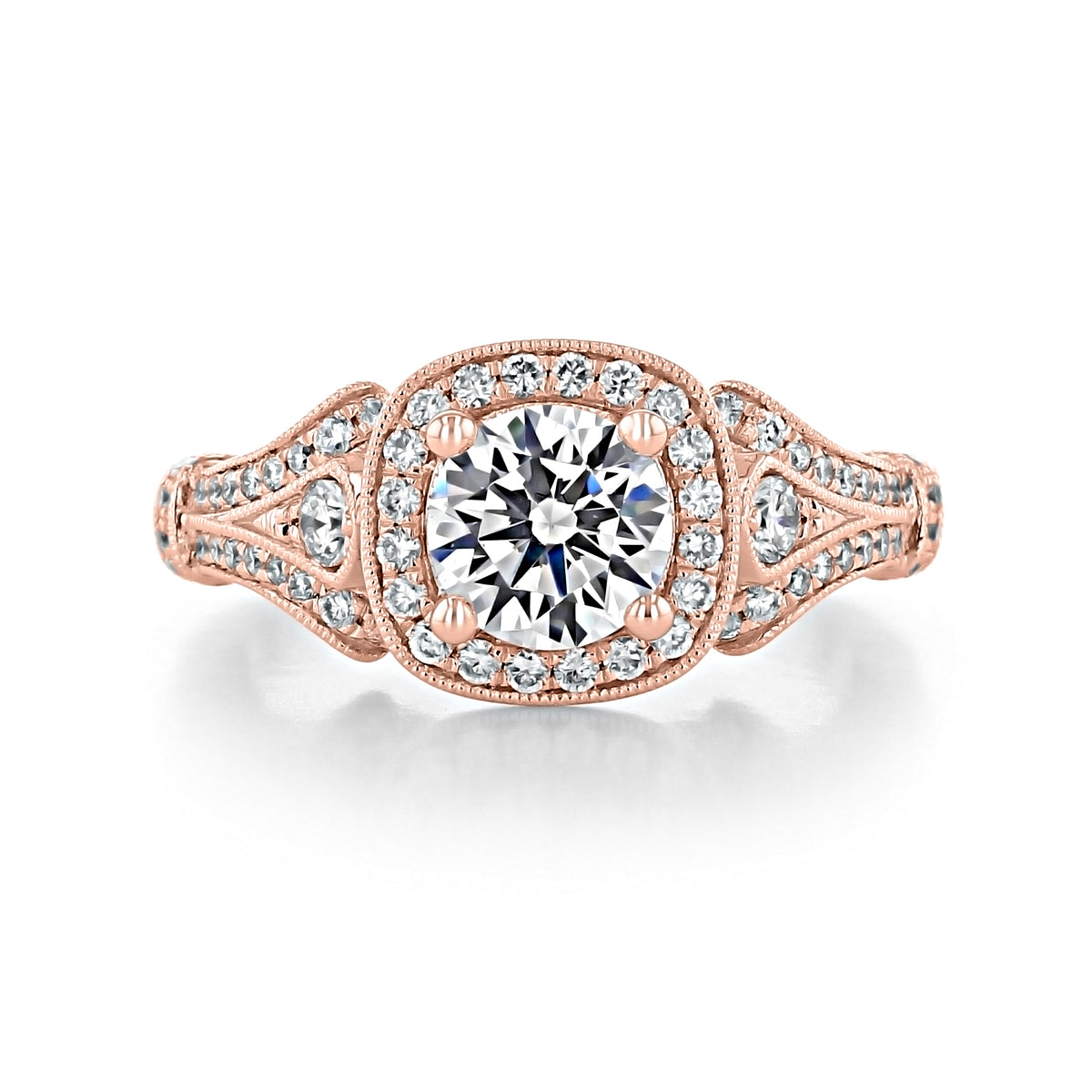 Delilah Halo Engagement Ring by Gabriel & Co. in rose gold, featuring a round center diamond, cushion halo, and pavé diamonds along the band.