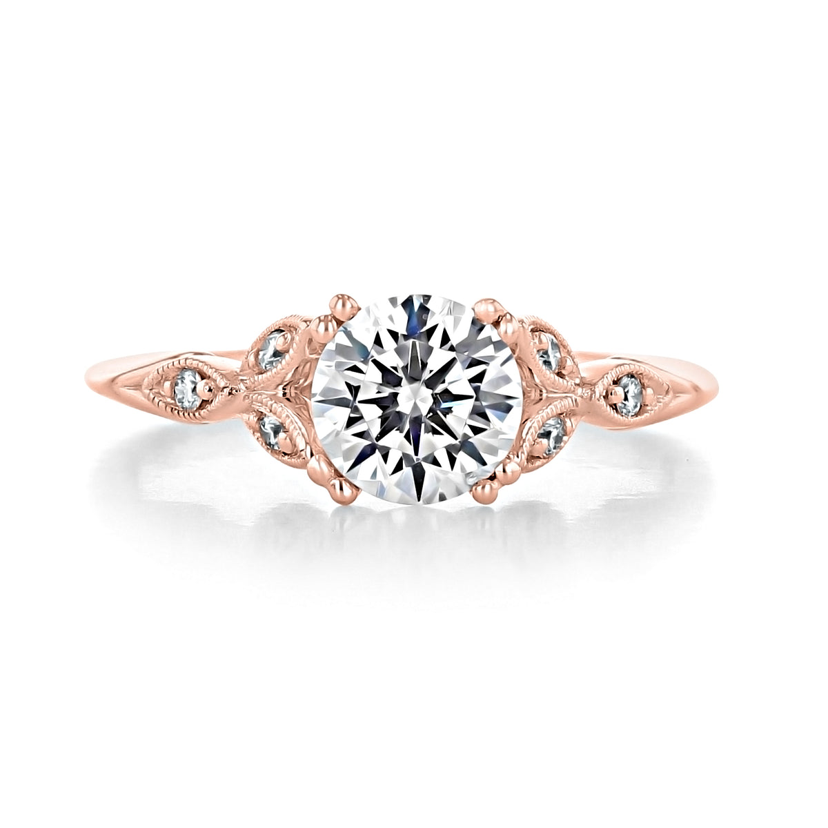 Celia Pavé Set Engagement Ring by Gabriel & Co. featuring a round brilliant cut diamond set in rose gold with a pavé band and intricate milgrain detail.