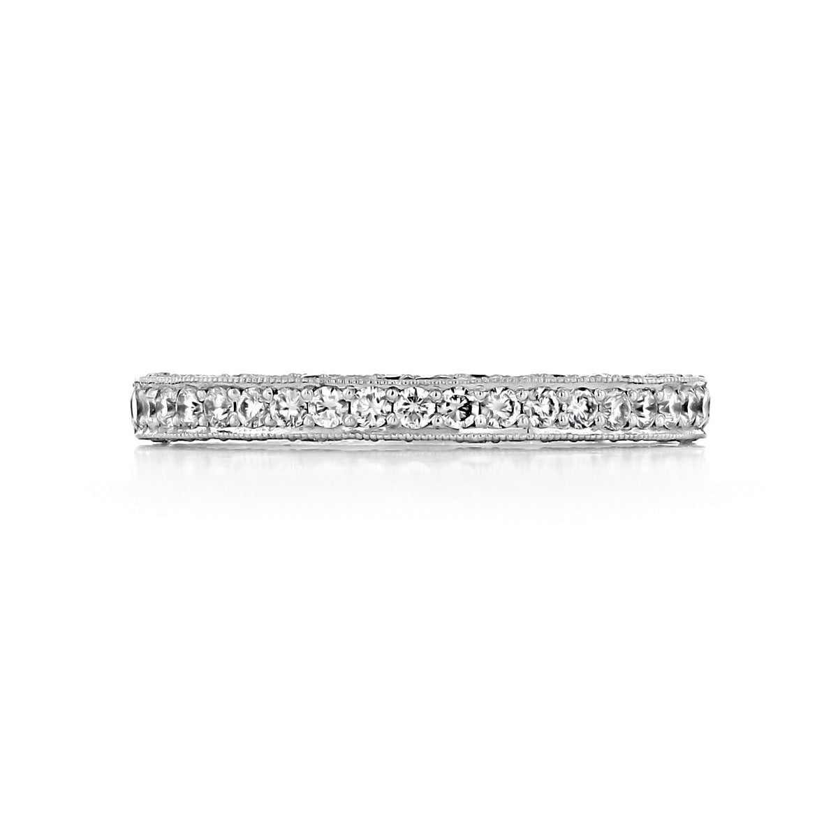 A thin platinum Blooming Beauties | Diamond Band - HT2522B12X set with a continuous row of round diamonds.