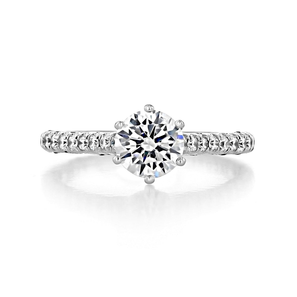 A Tacori Petite Crescent | Round Solitaire Engagement Ring - HT2546RD65W featuring a round-cut diamond solitaire set in a white metal band with micro pavé accent diamonds along the sides.