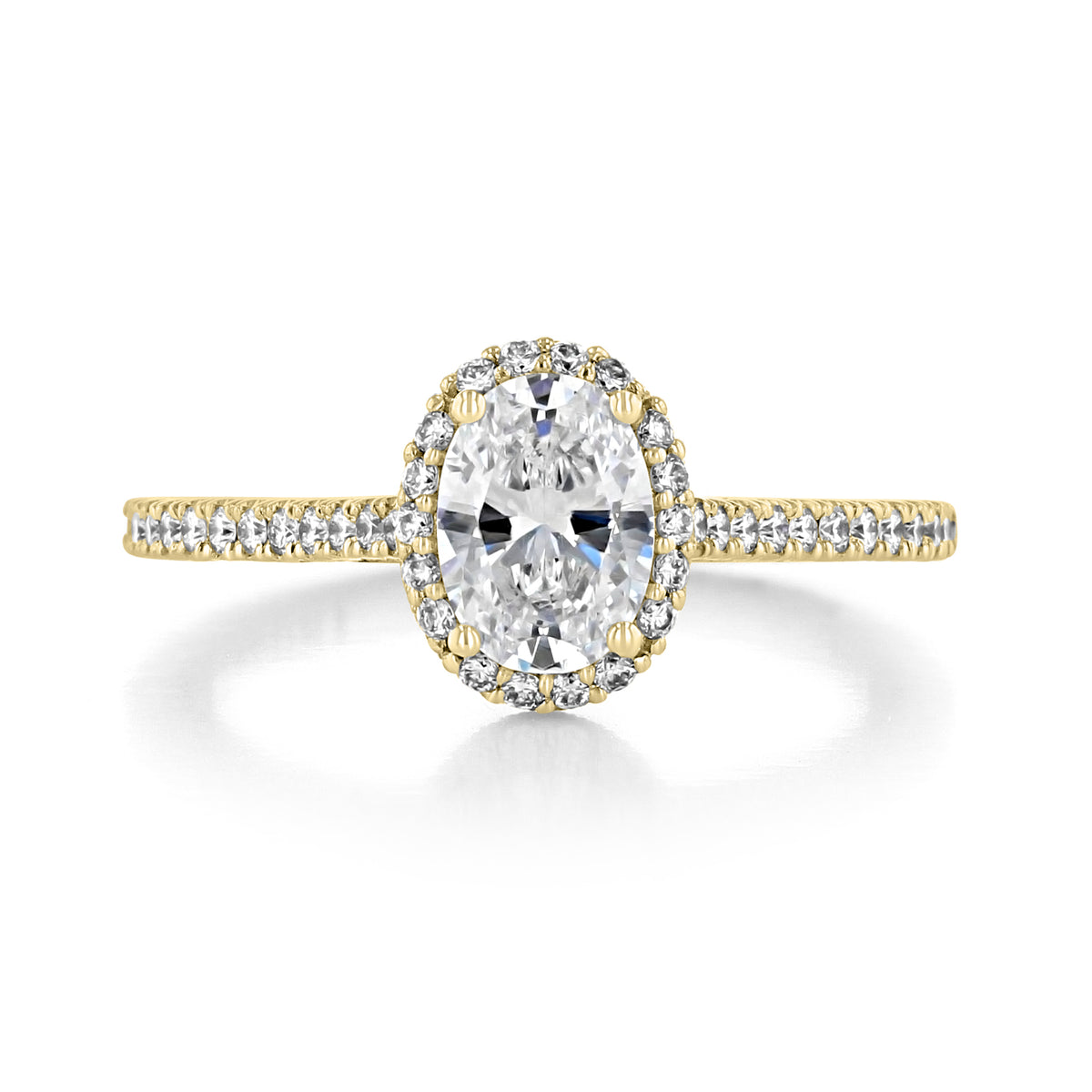 Tacori Petite Crescent HT254715OV75X55Y oval-cut diamond solitaire engagement ring with a micro pavé halo on a yellow gold band.