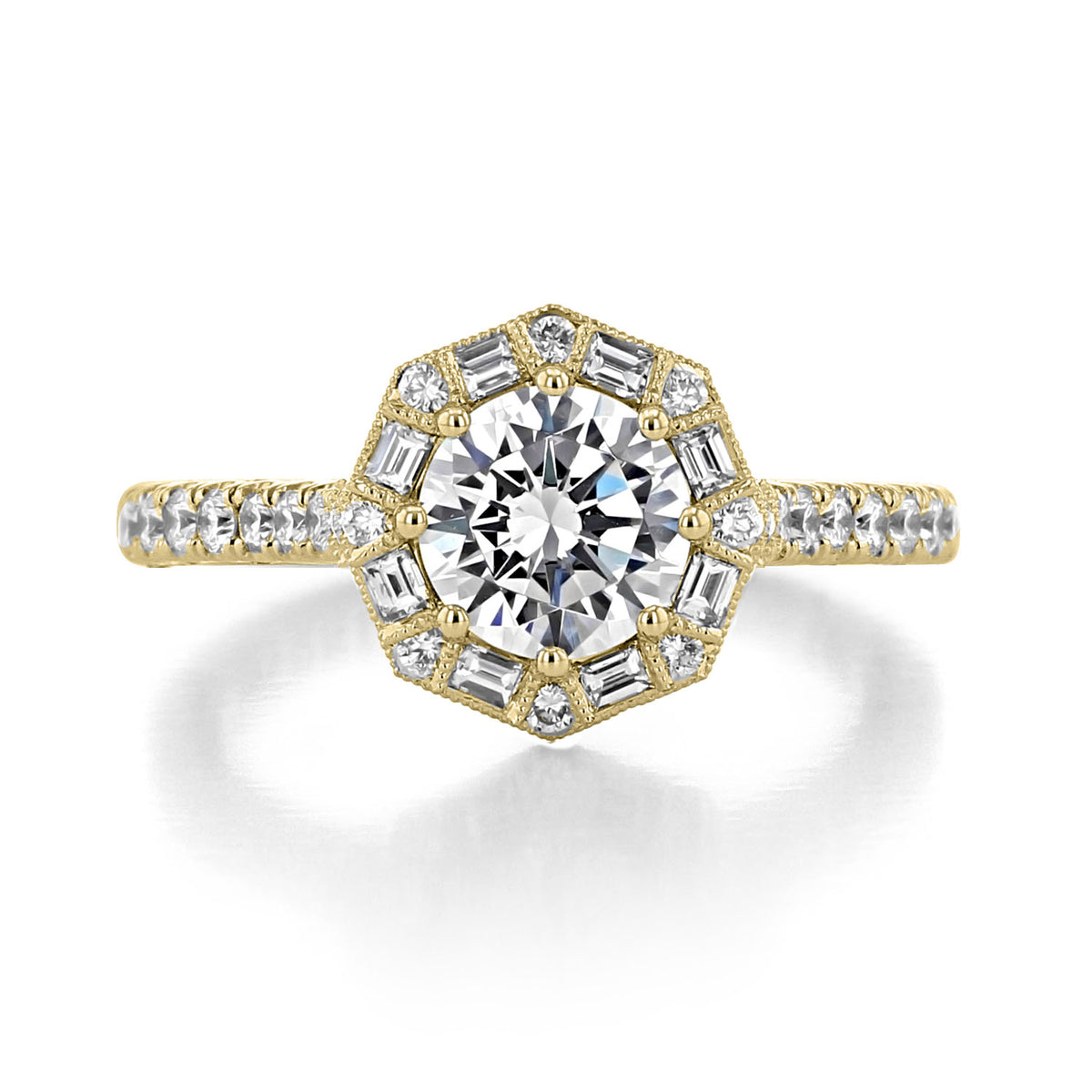 Tacori Petite Crescent | Round Bloom Engagement Ring (HT2556RD7Y) featuring a hand-crafted yellow gold band with a round center diamond in an octagonal halo of baguette and round cut diamonds, set on a diamond-accented band.