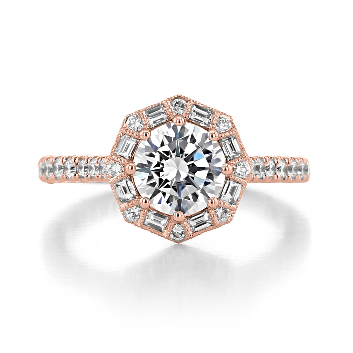 A Tacori Petite Crescent | Round Bloom Engagement Ring - HT2556RD7PK, featuring a hand-crafted round-cut diamond in a rose gold setting with a hexagonal halo of baguette and round-cut diamonds.