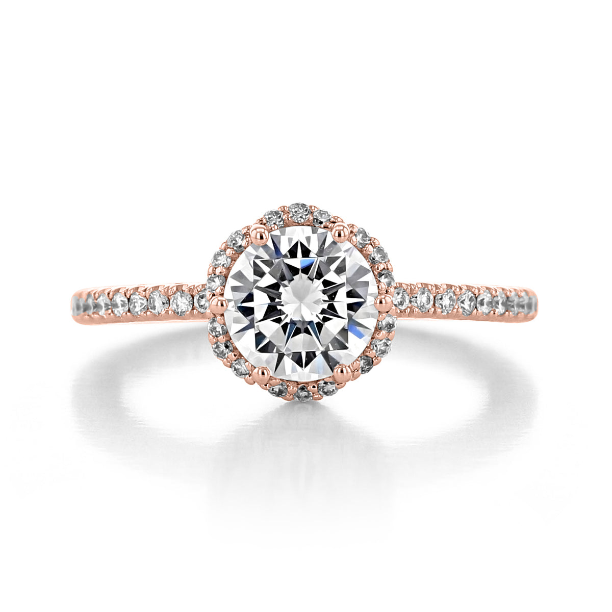 A round center diamond set in a Tacori Petite Crescent | Round Pavé Engagement Ring - HT257215RD7PK, featuring a pavé halo and pavé-set band in rose gold.