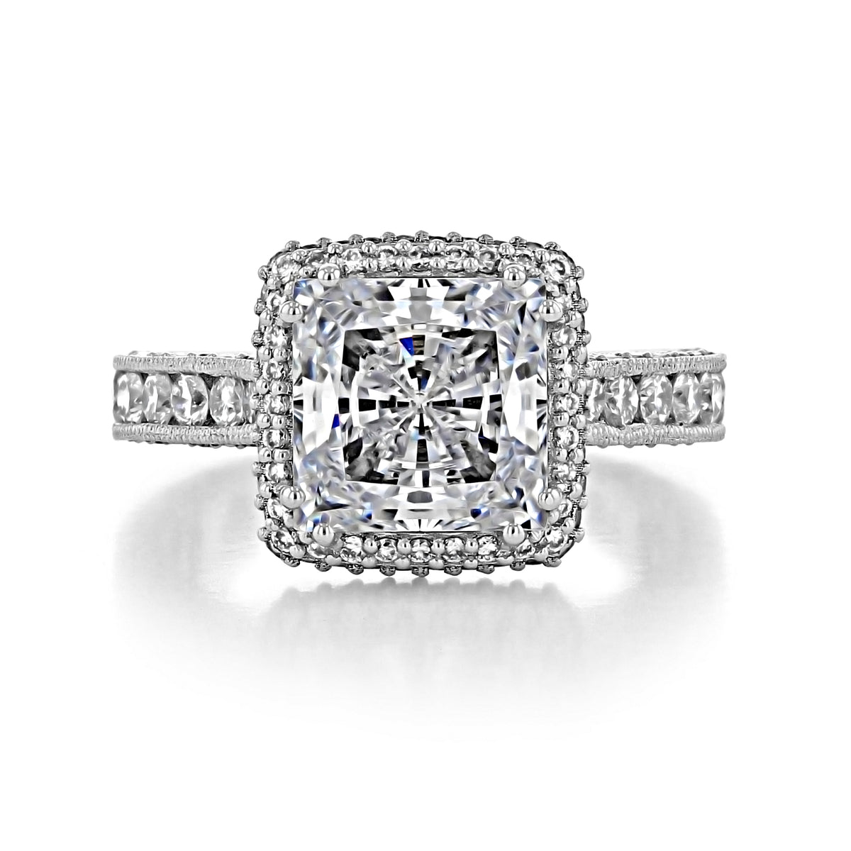 A Tacori RoyalT | Princess Pavé Engagement Ring - HT2607PR85W, featuring a white gold princess-cut center stone surrounded by a pavé halo on a pavé diamond band.