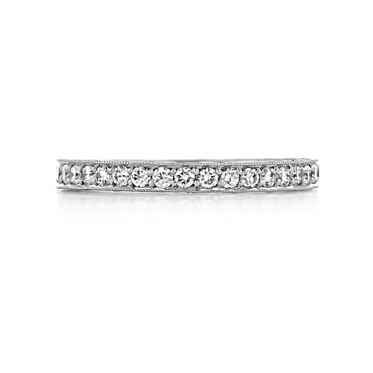 A Tacori RoyalT | Diamond Band - HT2626B34W in white gold, featuring an eternity style with a row of round diamonds and milgrain edges.