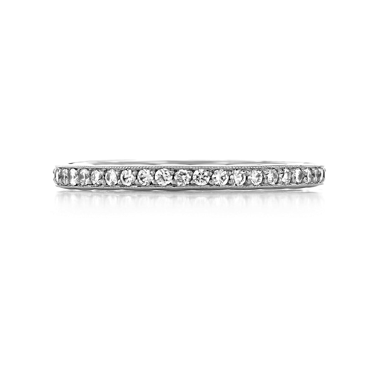 A slender RoyalT | Diamond Band - HT2627B34 featuring a row of small, round, pavé-set diamonds.
