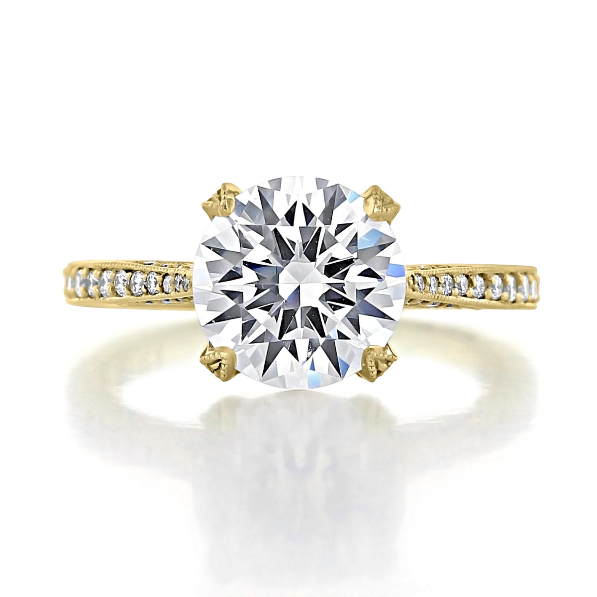 Tacori RoyalT | Round Pavé Engagement Ring - HT2627RD9Y featuring a round solitaire diamond set in a yellow gold band with pavé set diamonds.