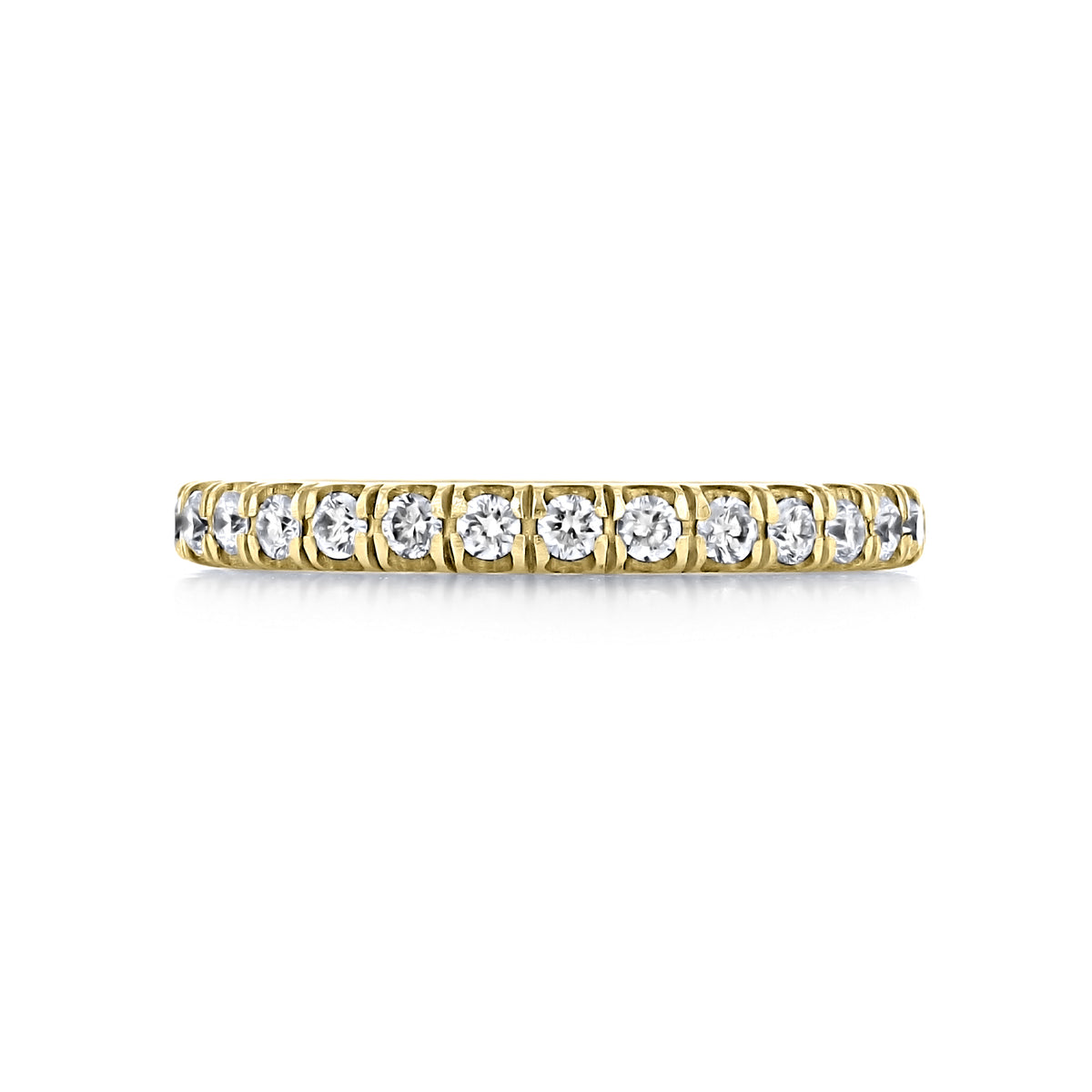 The Solina 2.50mm Diamond Eternity Band is a gold ring featuring a continuous row of round diamonds in a shared-prong setting.