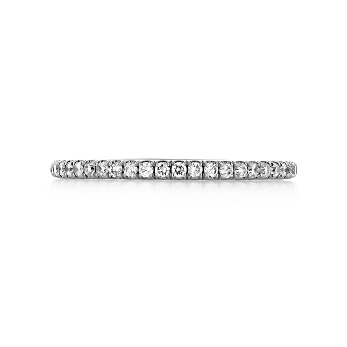 Solina 1.50mm Diamond Eternity Band in thin 14k white gold set with small round diamonds in a metallic setting.