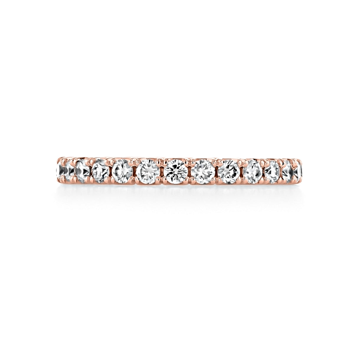 Opaline diamond eternity band in rose gold featuring a continuous row of round-cut diamonds in micro-prong settings.
