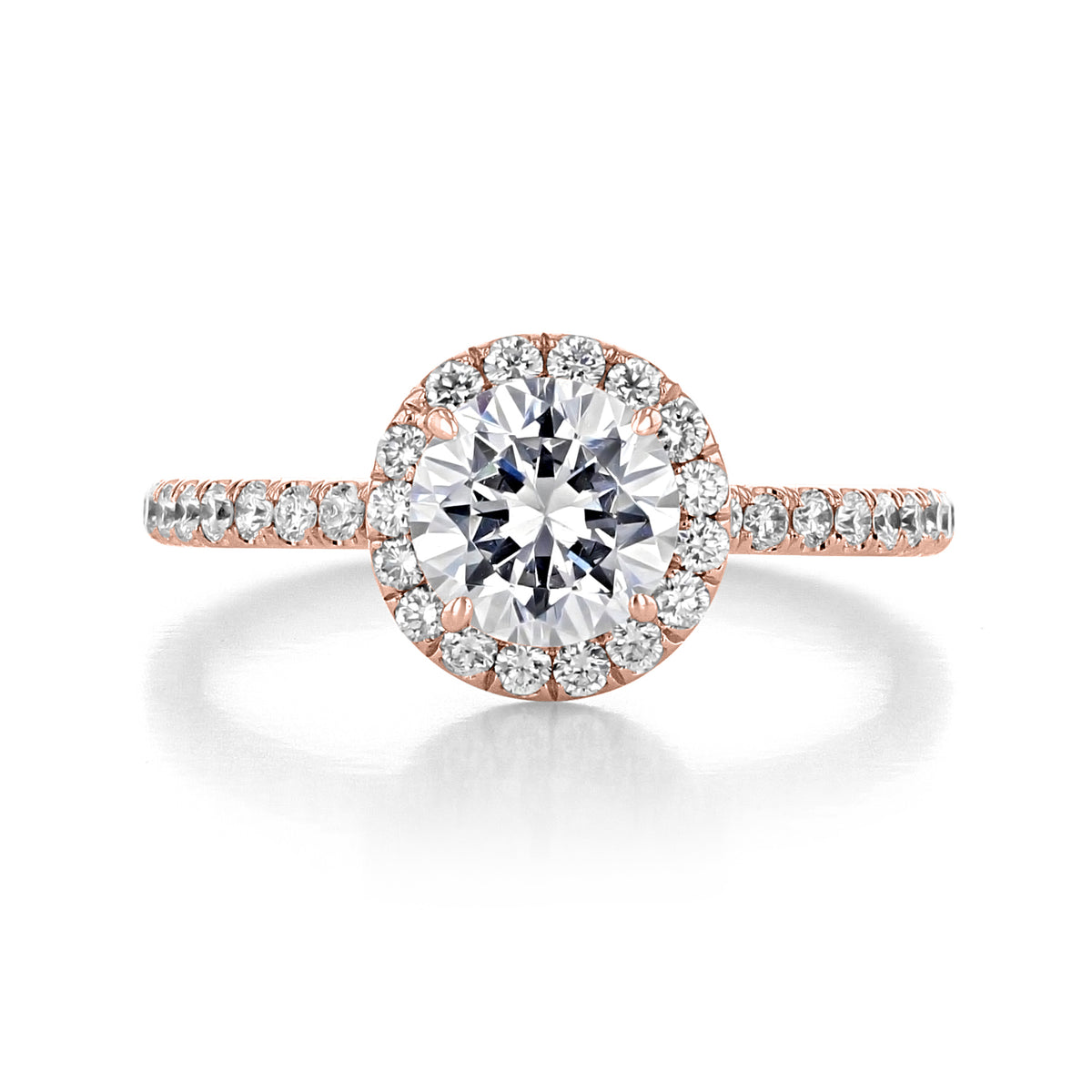 A rose gold Danhov Per Lei | Halo Engagement Ring - LE102 featuring a round center stone, a diamond halo, and accent diamonds along the band.