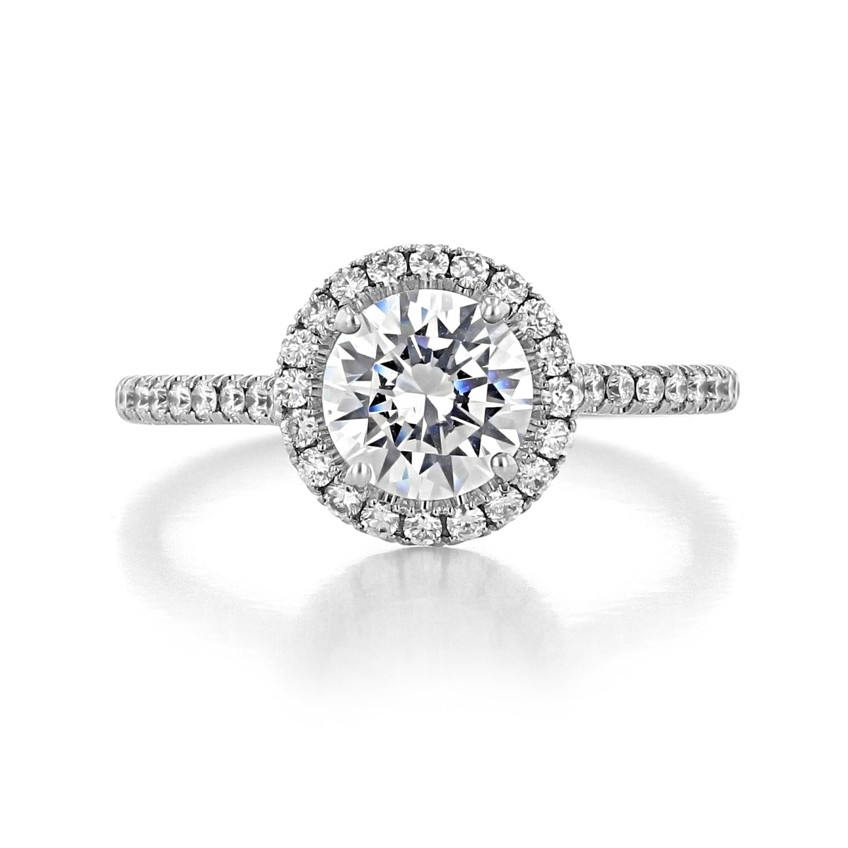 Danhov Per Lei | Halo Engagement Ring - LE112 featuring a round-cut diamond in a halo setting with a pavé-set band.