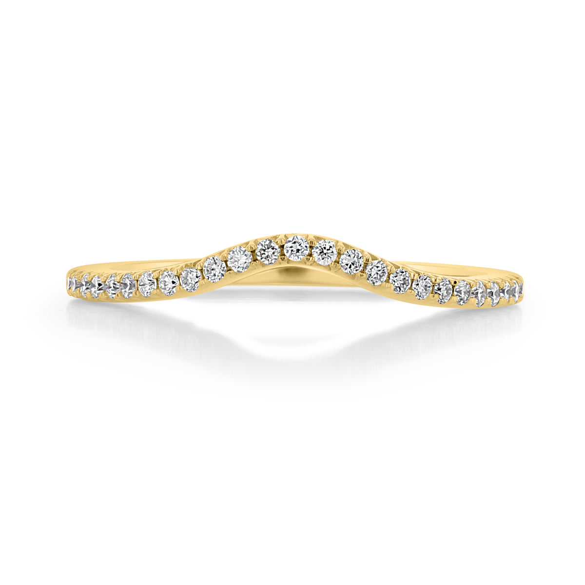 Cielo | Curved Diamond Wedding Band featuring a gold band with a curved center and pavé-set diamonds along the top.