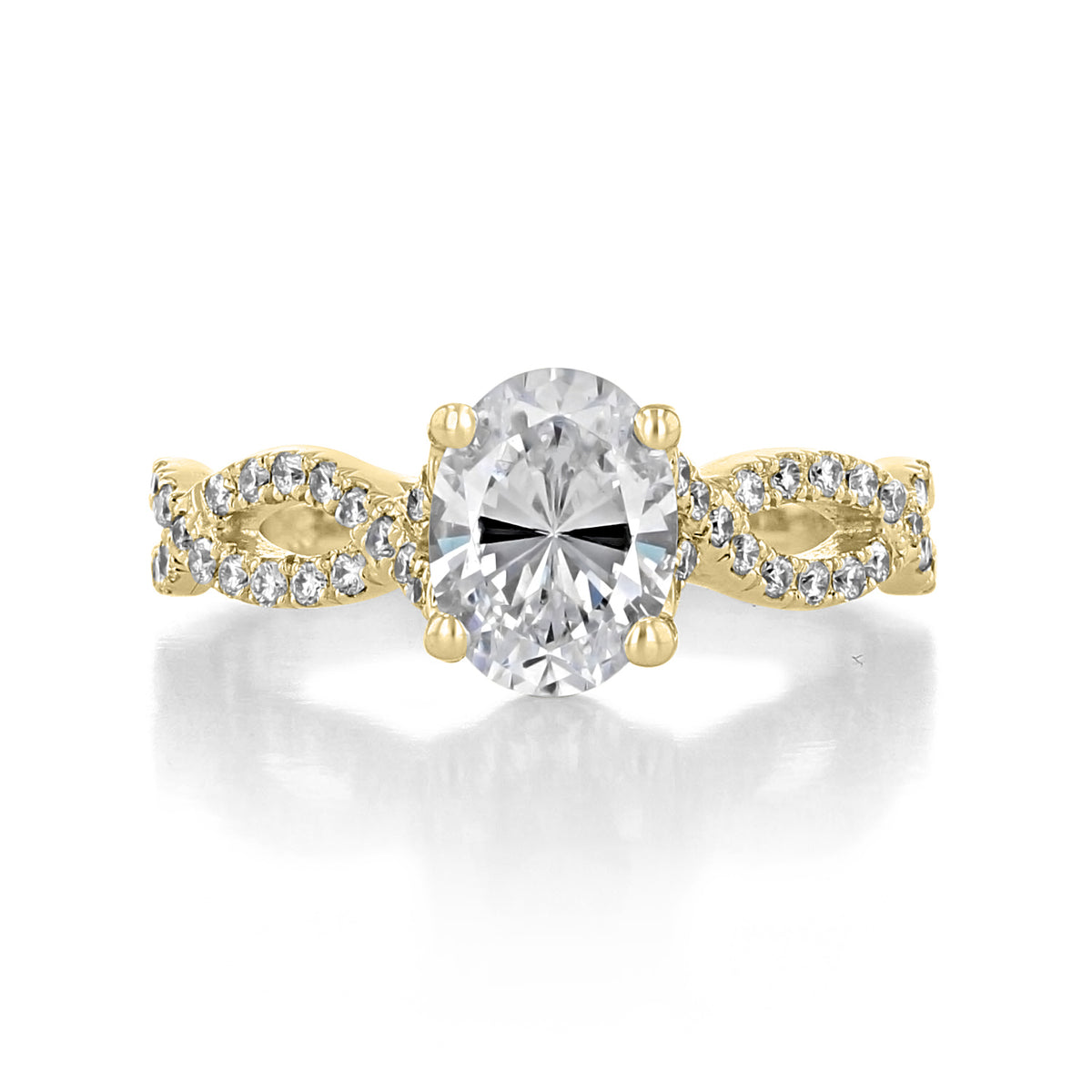 Calista | Oval Twisted Micro-Prong Engagement Ring featuring a large oval diamond with a twisted, micro-prong diamond-encrusted gold band.