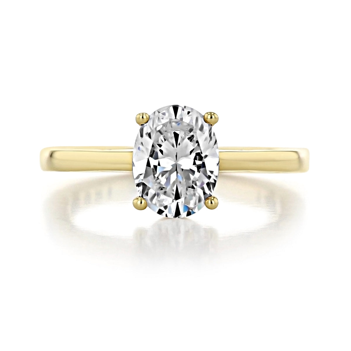 The Coastal Crescent | Oval Solitaire Engagement Ring - P100OV85X65Y featuring an oval solitaire diamond set on a plain yellow gold band.