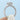 Side view of a Coastal Crescent | Emerald Solitaire Engagement Ring - P103EC7X5, featuring an emerald-shaped diamond center stone, a halo of small accent diamonds, and intricate decorative metalwork along the band.