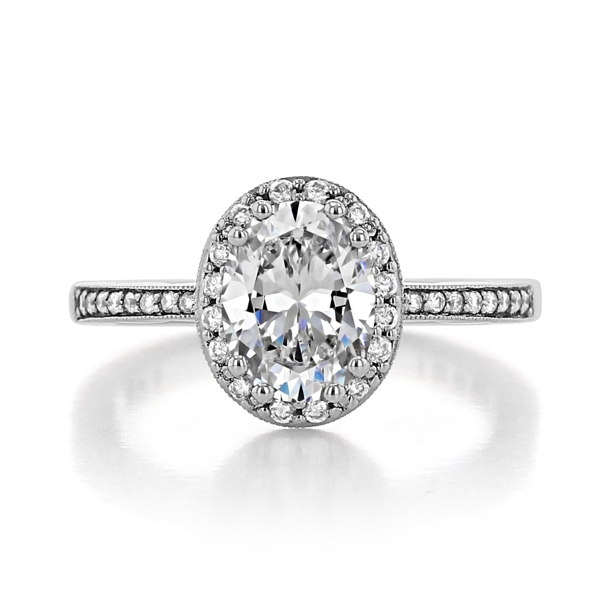Coastal Crescent | Oval Solitaire Engagement Ring - P103OV85X65 featuring an oval-cut diamond in a halo setting with diamonds along the band.