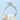 Tacori Coastal Crescent | Round Solitaire Engagement Ring - P103RD65W with a 1.00 ct. center diamond, featuring a diamond-accented band and intricate side detailing against a light blue background.
