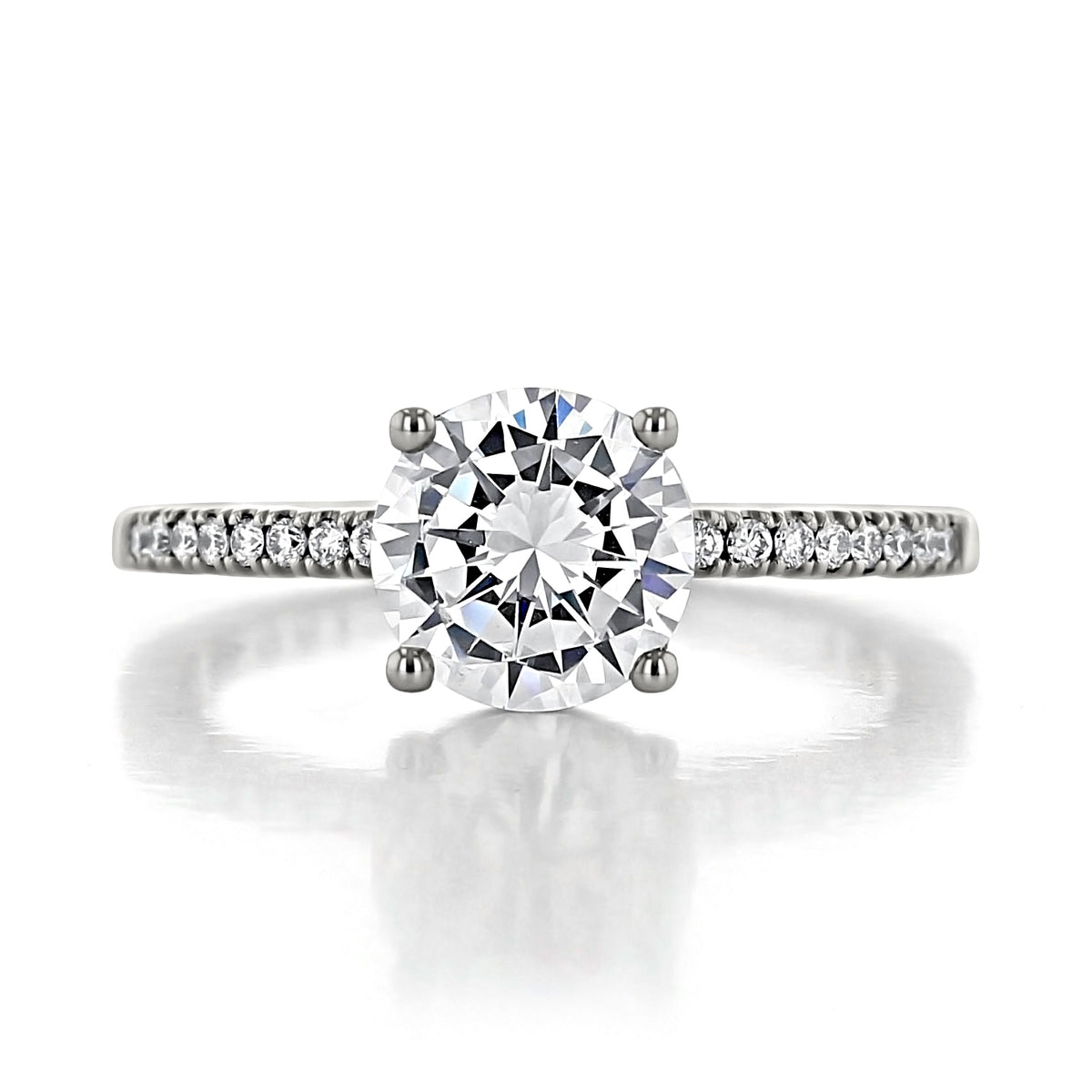 A Coastal Crescent | Round Solitaire Engagement Ring - P104RD75W featuring a round solitaire diamond with a pavé band on a white surface.
