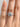 Petite Crescent | Cushion Solitaire Engagement Ring - HT2560CU65W featuring a cushion-cut solitaire diamond, halo, and pavé-set band worn on a finger.
