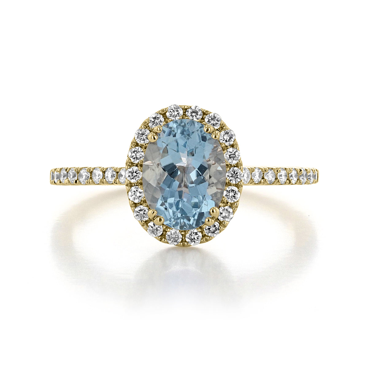 Makur Aquamarine Engagement Ring R0861-4AQ featuring an oval aquamarine in yellow gold with a diamond halo and a micro-prong diamond band.