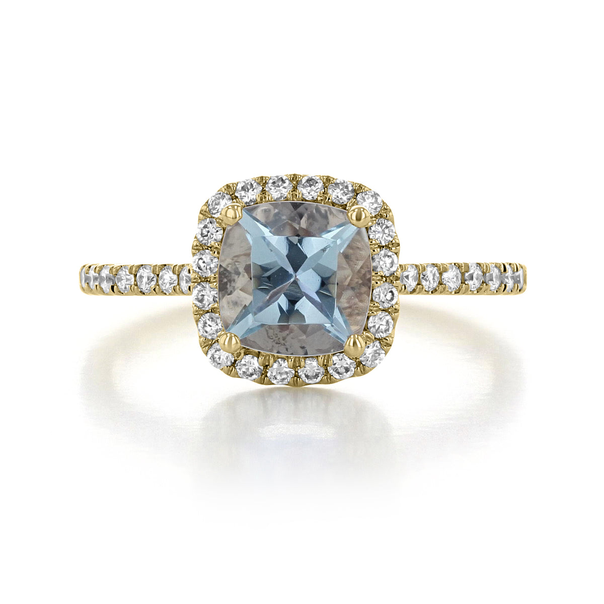Makur Aquamarine Engagement Ring | R1034-4 featuring a cushion-cut aquamarine with a diamond halo and pavé-set band in yellow gold.