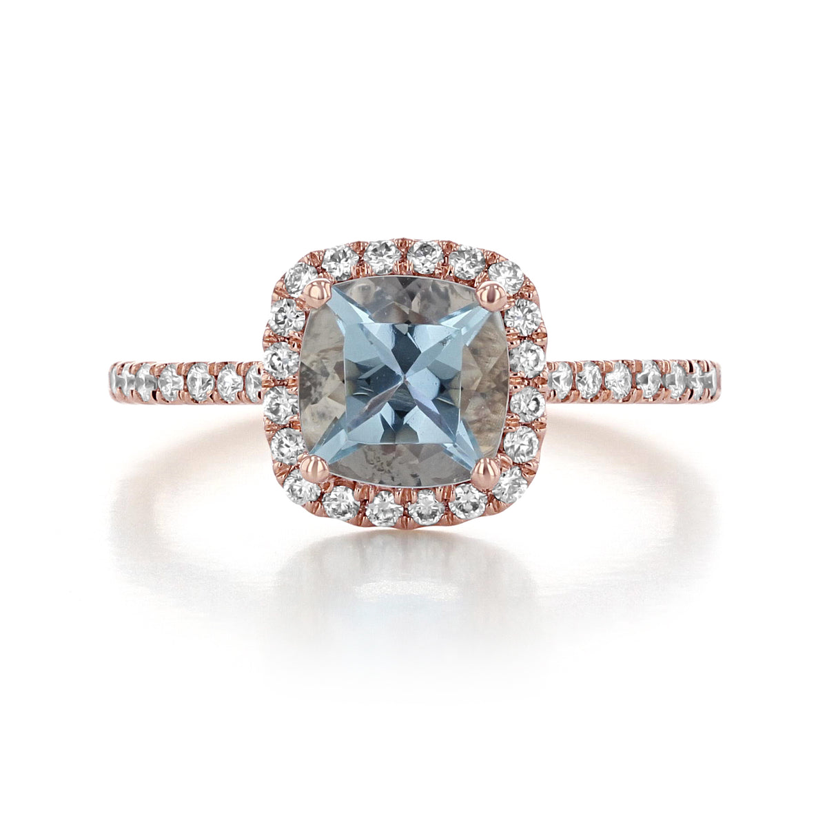 Makur Aquamarine Engagement Ring | R1034-4 featuring a cushion-cut aquamarine, a diamond halo, and a diamond-accented rose gold band.