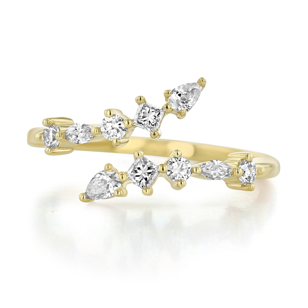 Makur Prong Set Diamond Bypass Ring | R1144 featuring a series of prong-set diamonds in pear, round, and princess cuts along both open gold bypass ends.