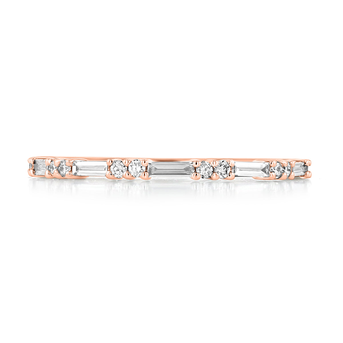 Belmont | Round and Baguette Diamond Wedding Band in rose gold featuring an alternating pattern of round and baguette-cut diamonds in a classic ring stack style.