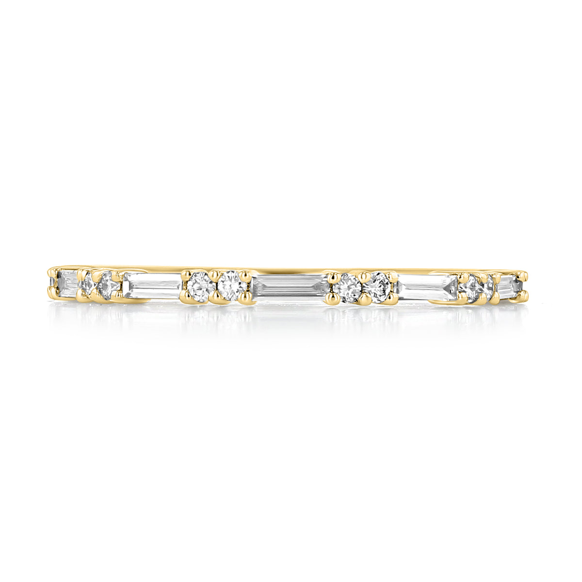 Belmont gold wedding band featuring alternating round and baguette diamonds.