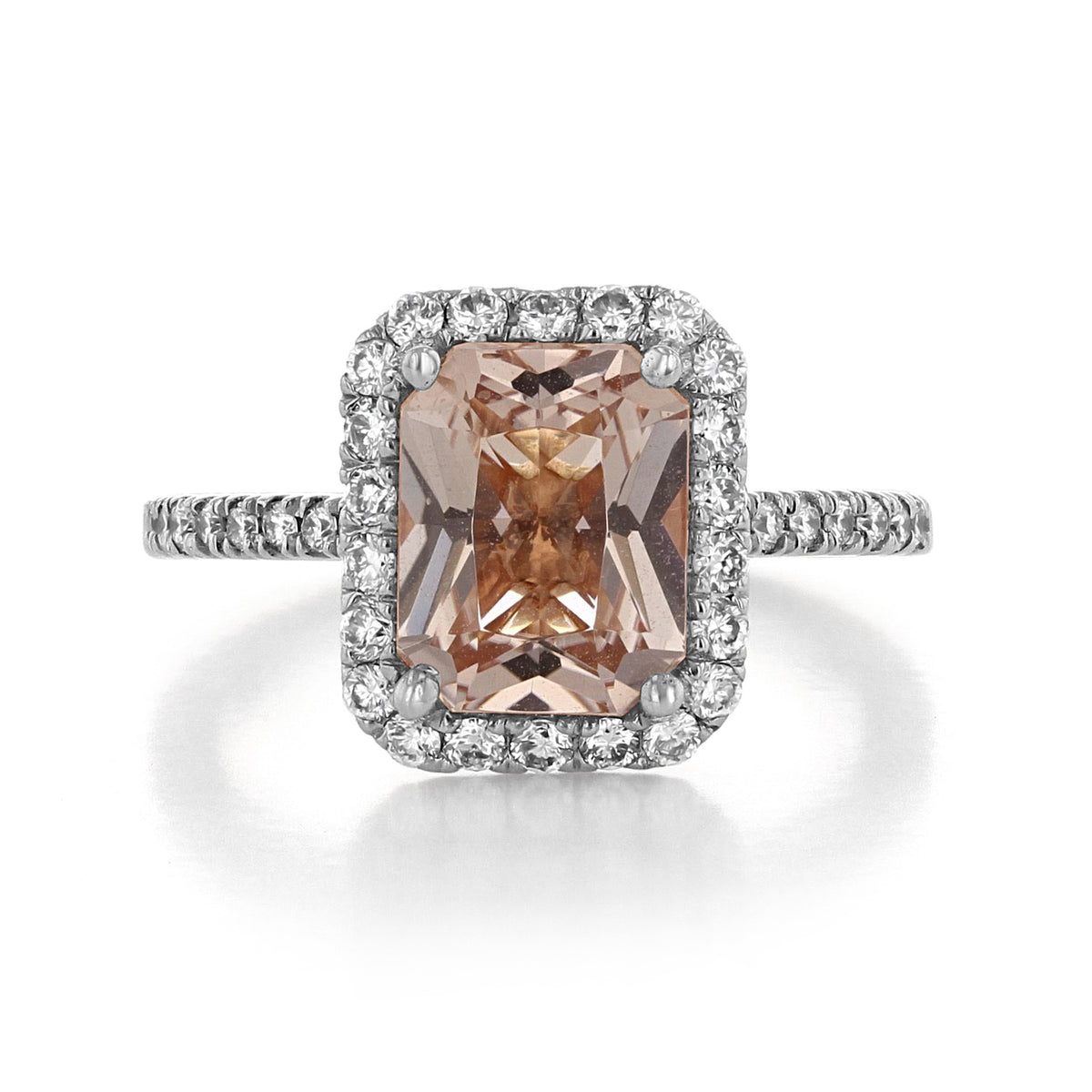 Makur Morganite Engagement Ring | R893-4 featuring an emerald-cut peach morganite, a diamond halo, and a diamond-accented vintage band.