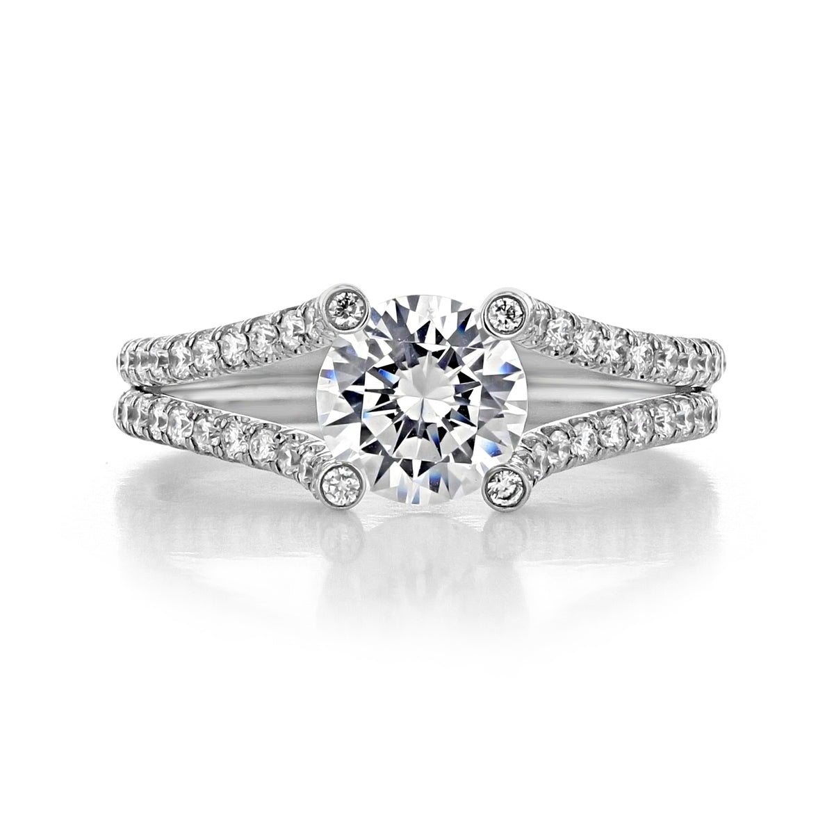 Danhov Solo Filo | Micro-Prong Engagement Ring - SE101 featuring a round-cut diamond, a split shank with pavé-set diamonds, and four micro-prong settings.